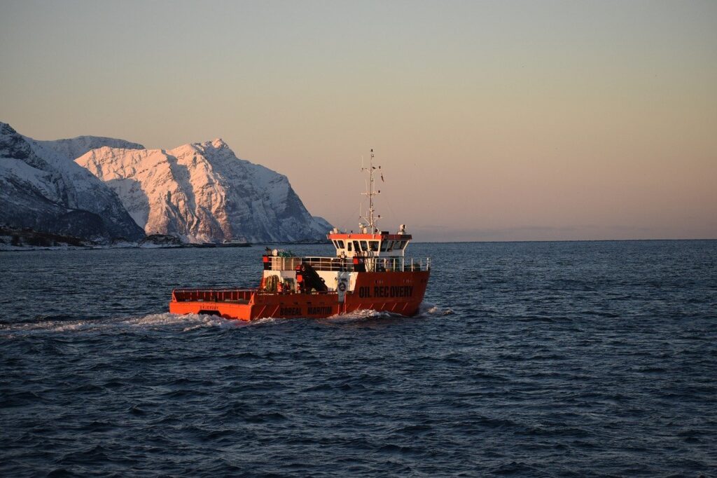 ship, ocean, mountains-8489583.jpg